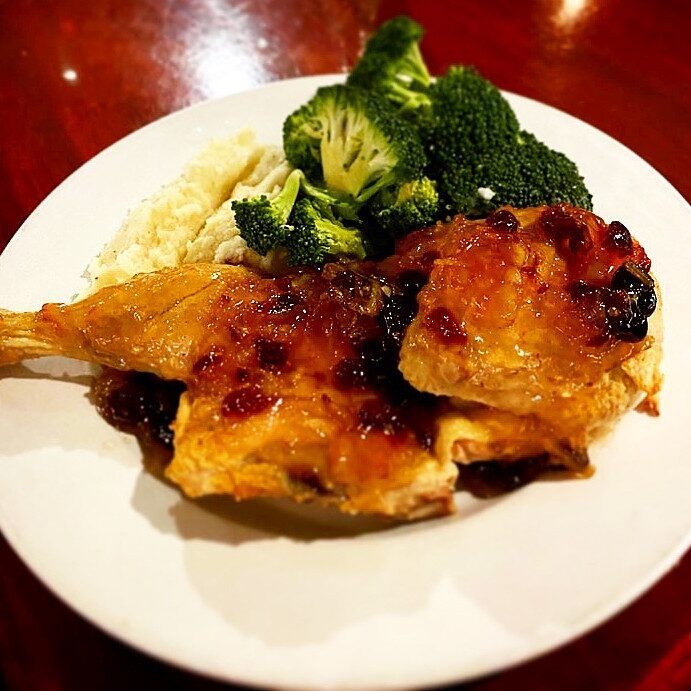 A plate of food with broccoli and rice on it.